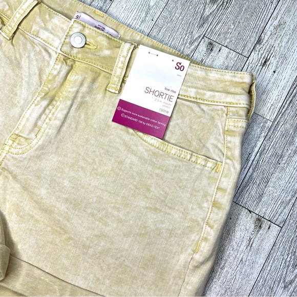 SO Brand Yellow Acid Wash Stretch Denim Shortie Shorts Low Rise Rolled Hems NWT - Picture 3 of 6